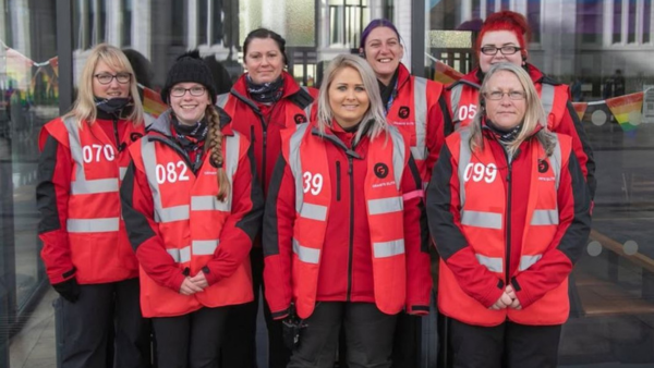 Image of femal security officers in action at an event